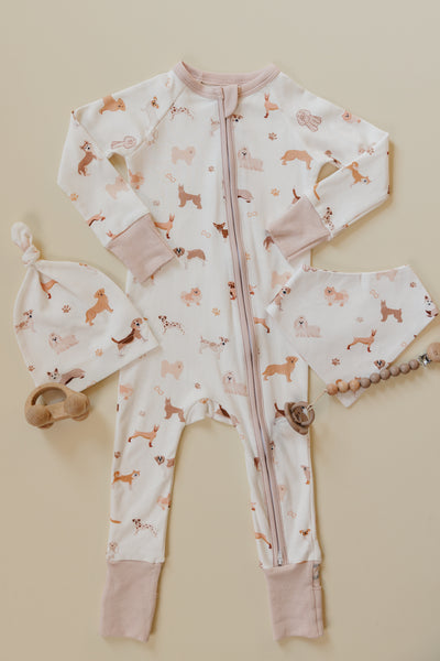 August & Ivy organic Pima cotton zip romper for babies, soft fabric, displayed on a neutral background.