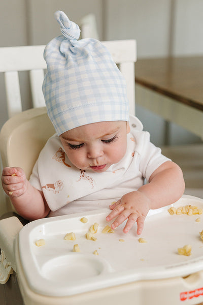 Organic Pima Cotton knotted hat by August & Ivy™, showing soft fabric and stylish knot design for babies or toddlers.