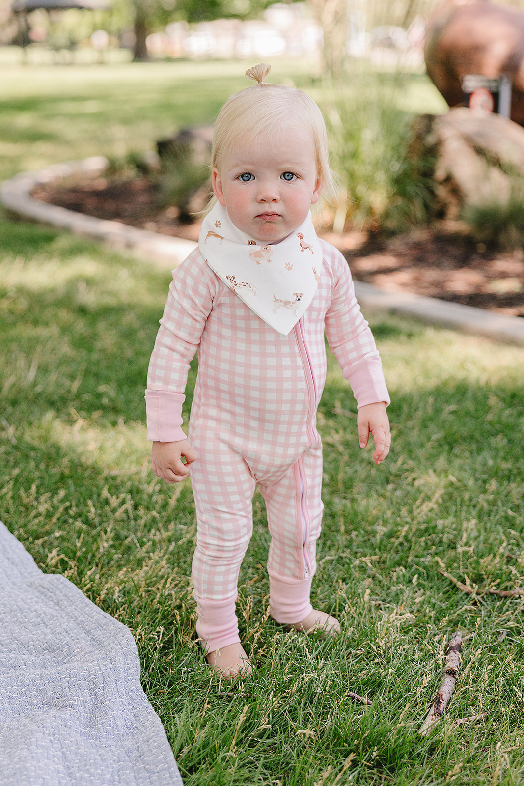 August & Ivy organic Pima cotton zip romper for babies, soft and comfortable with a front zipper closure.