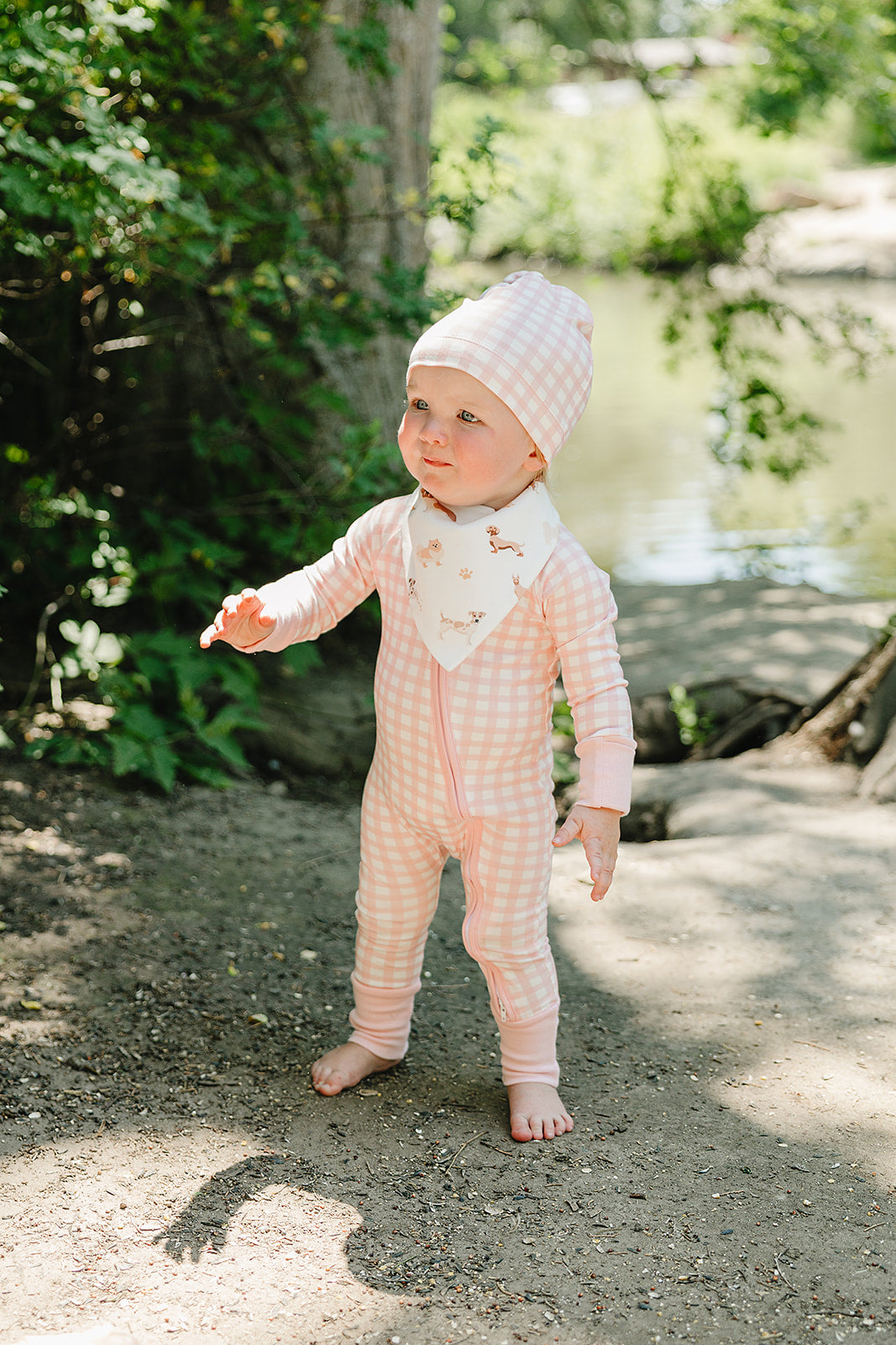 Organic Pima cotton knotted hat by August & Ivy™ featuring a soft, breathable design with a stylish knotted top.