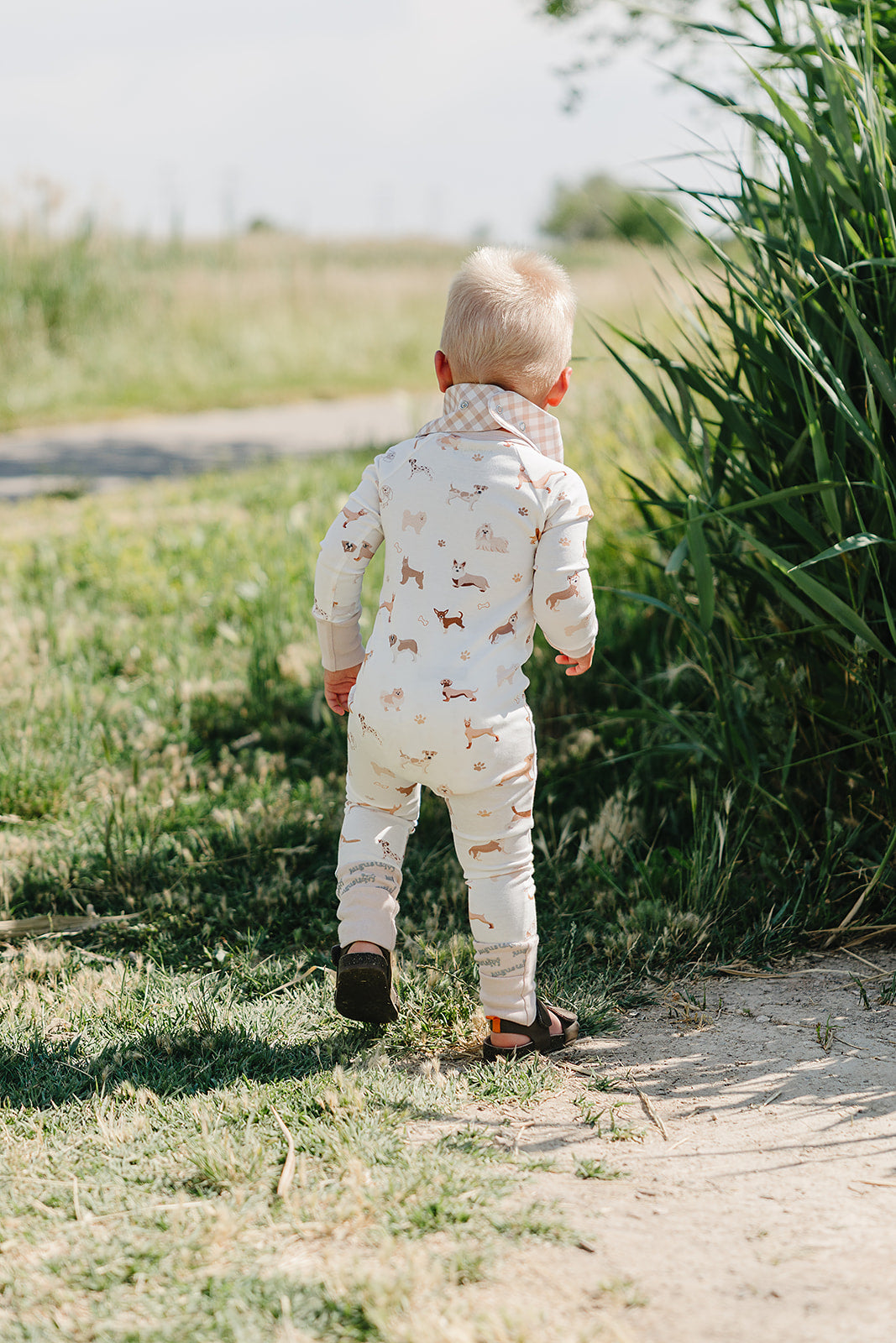 August & Ivy organic Pima cotton zip romper for babies, soft and comfortable with a front zipper, perfect for everyday wear.