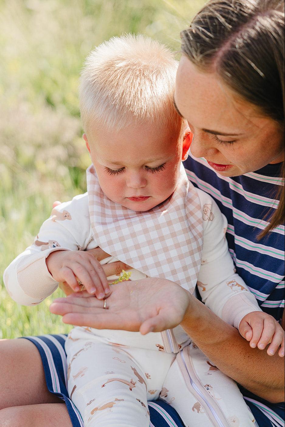 August & Ivy organic Pima cotton zip romper for babies, soft and comfortable with front zipper closure.