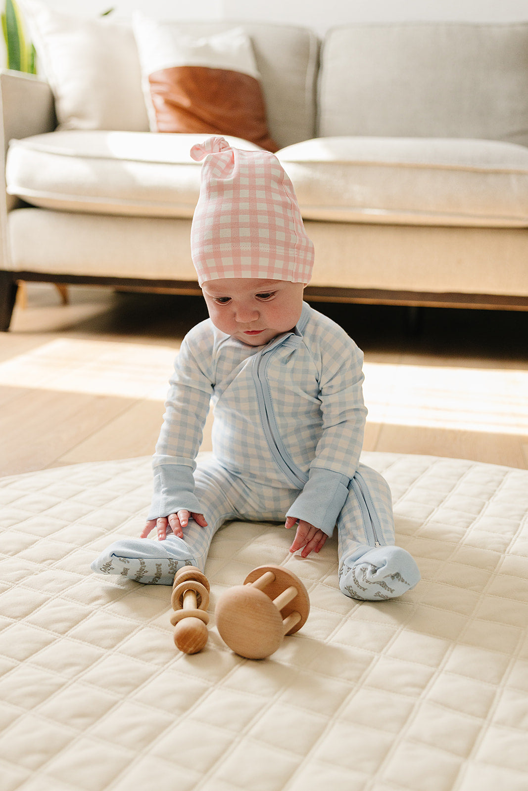 Organic Pima Cotton knotted hat by August & Ivy™ with a soft, breathable fabric and stylish knot detail.