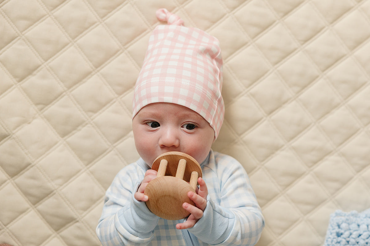 Organic Pima cotton knotted hat by August & Ivy™ with a soft, breathable fabric and a stylish knotted design for babies.