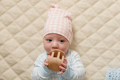 Organic Pima cotton knotted hat by August & Ivy™ with a soft, breathable fabric and a stylish knotted design for babies.