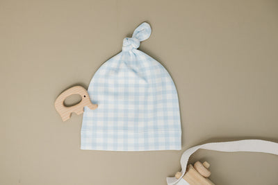 Organic Pima Cotton knotted hat by August & Ivy™, featuring soft fabric and a stylish knotted design for comfortable wear.