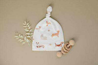 Organic Pima Cotton knotted hat by August & Ivy™ featuring a soft, breathable design with a stylish knot detail.
