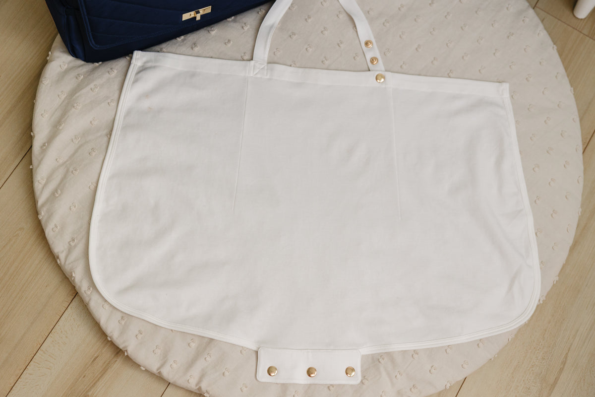 August & Ivy™ nursing cover with soft fabric, adjustable neck strap, and stylish design for comfortable breastfeeding.