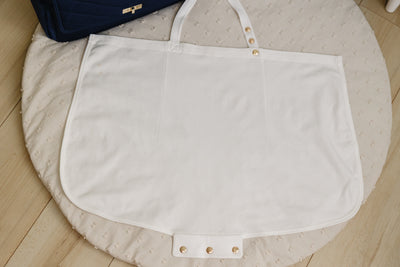 August & Ivy™ nursing cover with soft fabric, adjustable neck strap, and stylish design for comfortable breastfeeding.