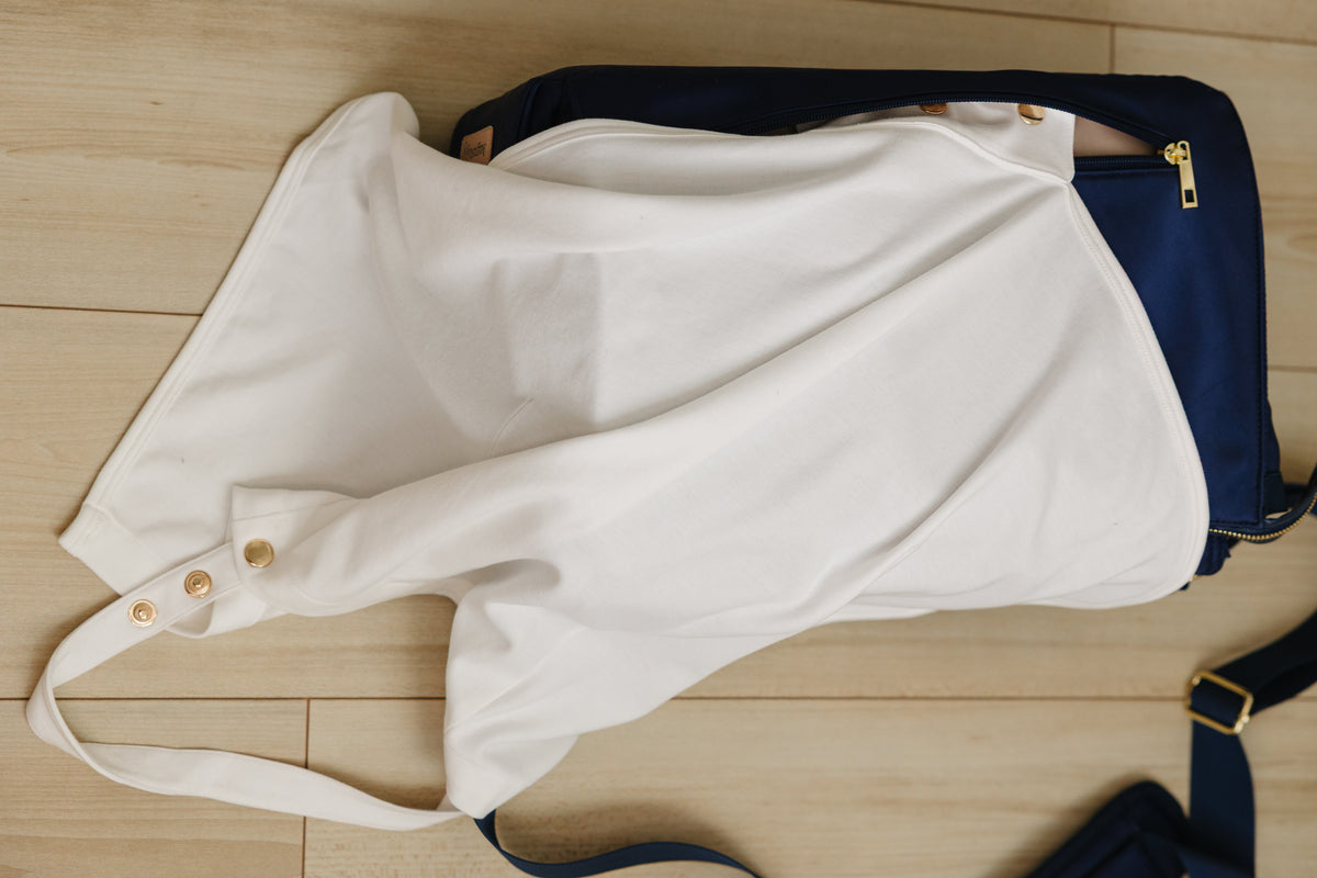 August & Ivy™ nursing cover in soft, breathable fabric with adjustable straps and stylish design for comfortable breastfeeding.