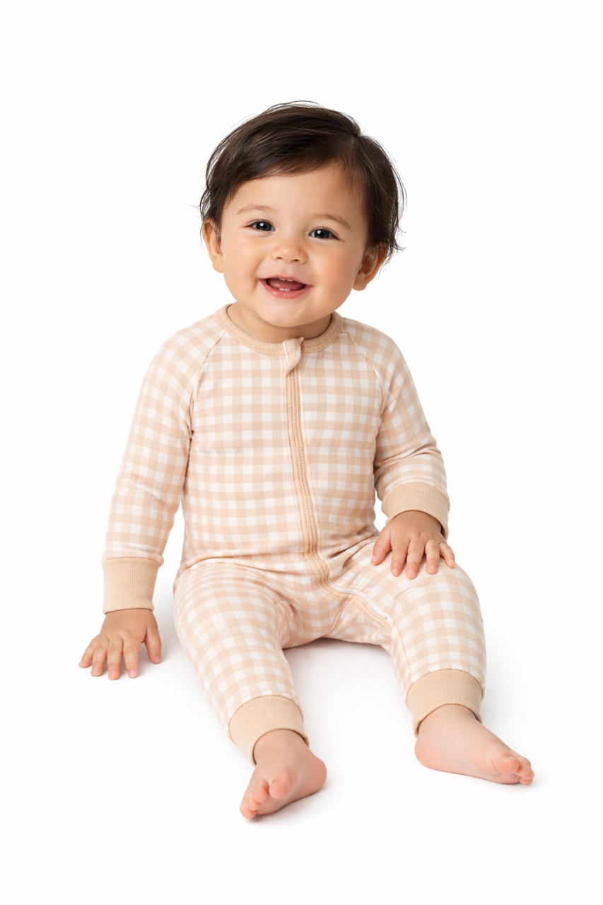 Organic Pima cotton romper by August & Ivy, soft fabric, sleeveless design, and snap closures for easy dressing.