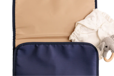 Portable wipeable changing pad included with the August & Ivy IvyGo diaper bag for clean diaper changes on the go.