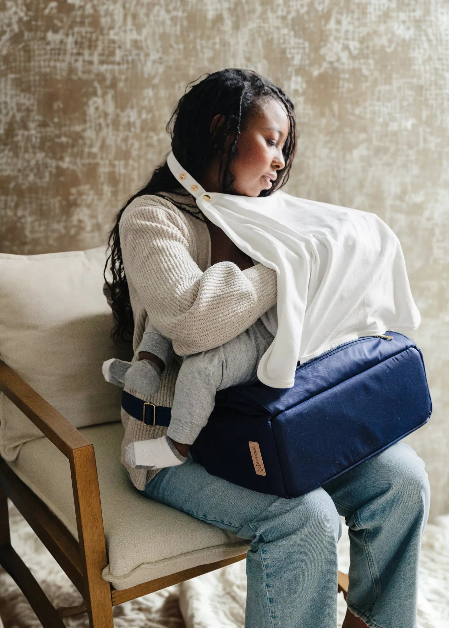 Modern diaper bag helping moms breastfeed comfortably in public